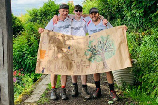 Image of alumni Pete, Tommy and Denys on Hadrian's Wall